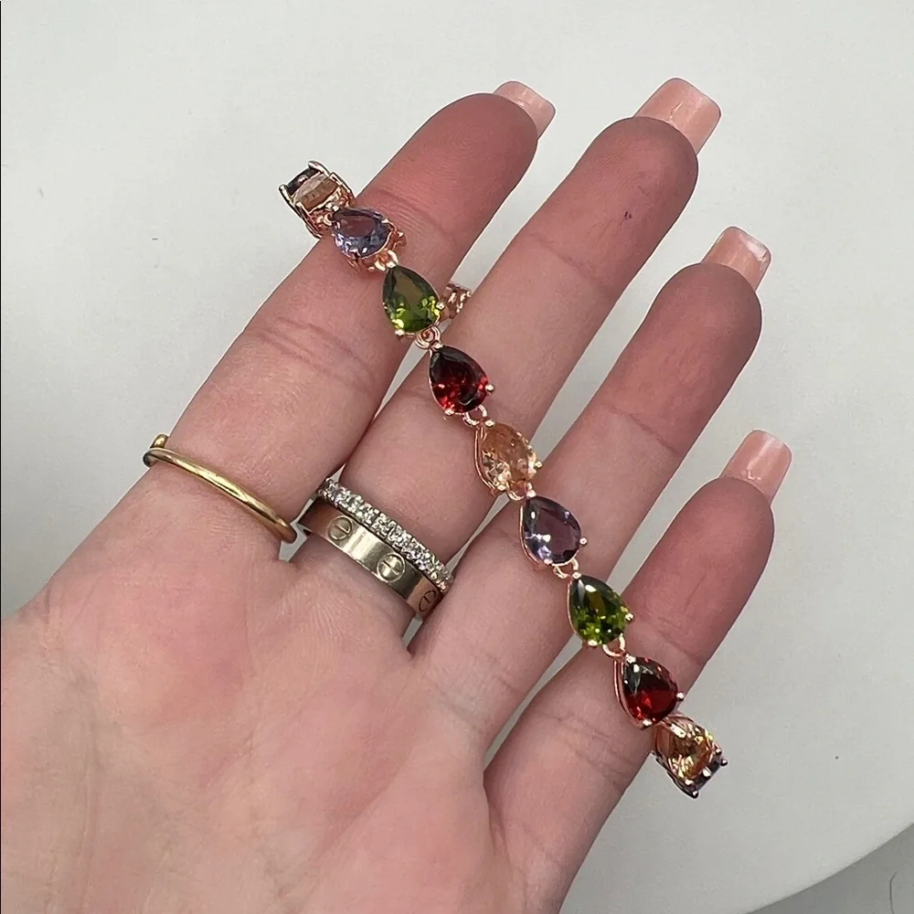 186. Rose Gold Plated Multi Jewel Tone Bracelet 7 1/4”